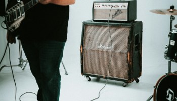 guitar amplifier near drum instrument